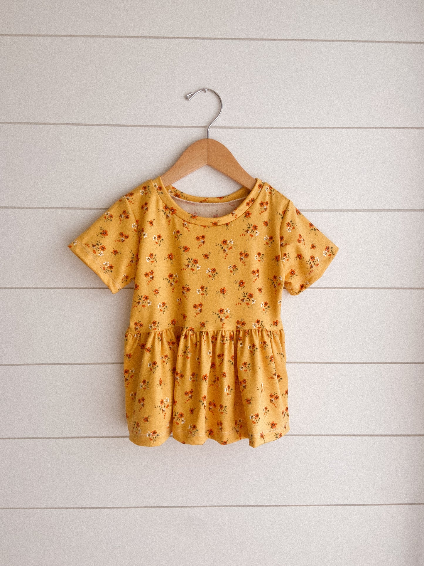 Marigold Floral Peplum Top